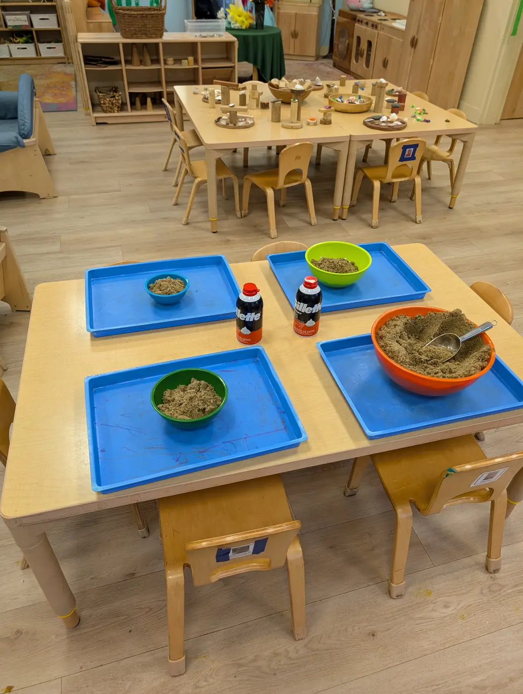 A sensory play station with kinetic sand at Blossom Station